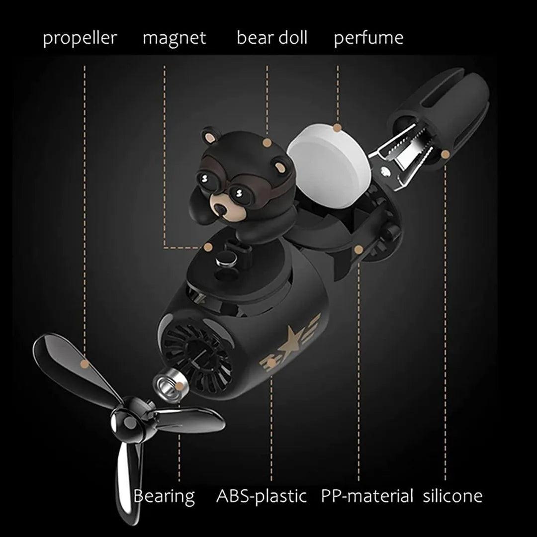 Detailed view of the bear pilot-themed car air freshener, showcasing its components including the propeller, magnet, bear doll, perfume, bearing, ABS plastic, PP material, and silicone.