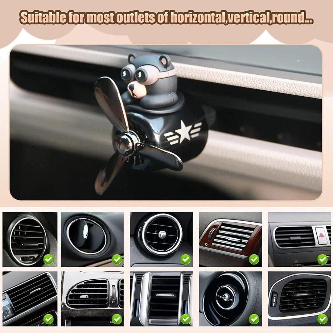 Bear pilot-themed car air freshener shown installed in various types of car air outlets, demonstrating compatibility with horizontal, vertical, and round air vents.