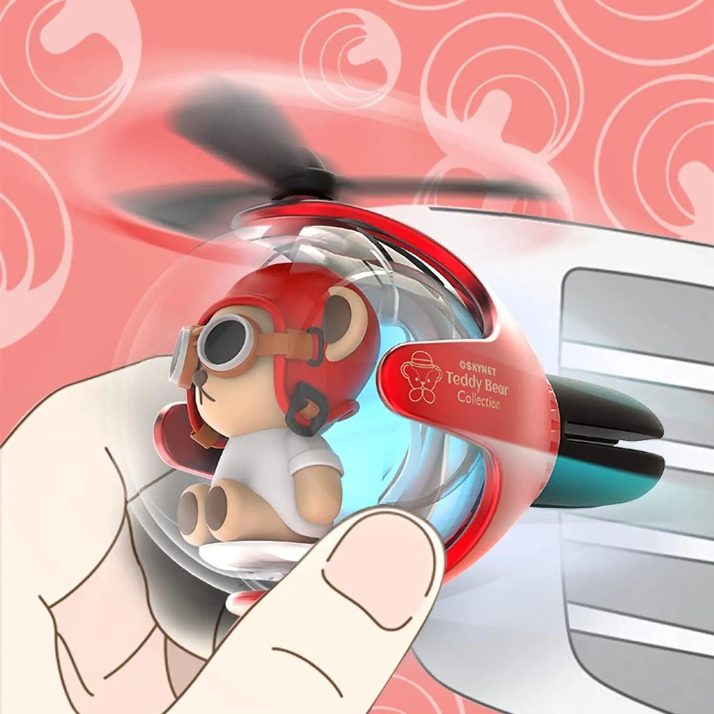 Close-up of Bear Pilot Car Air Freshener with a Propeller Diffuser in hand, featuring a red design, attached to a car vent