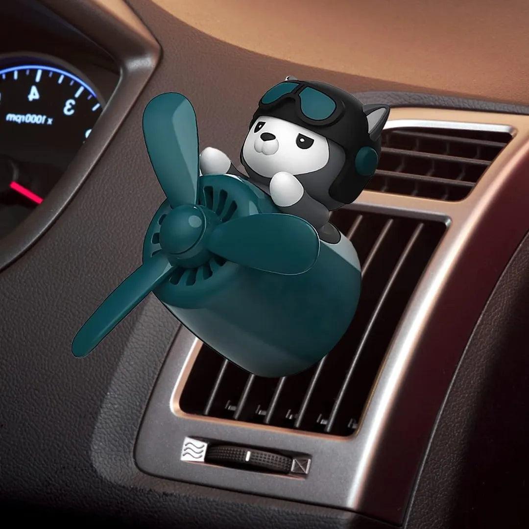 Husky Dog Pilot Car Air Freshener installed on a car vent, showcasing its practical and decorative use.
