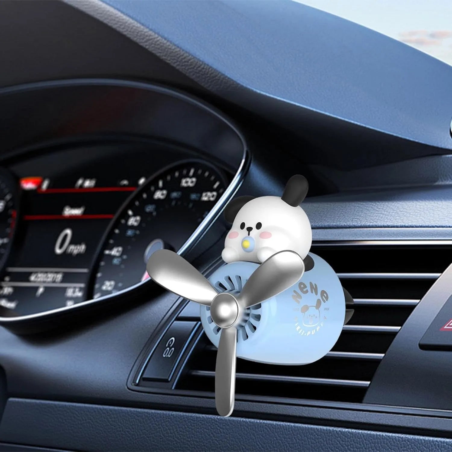 Dog Pilot Car Air Freshener with Propeller Diffuser attached to car air vent.