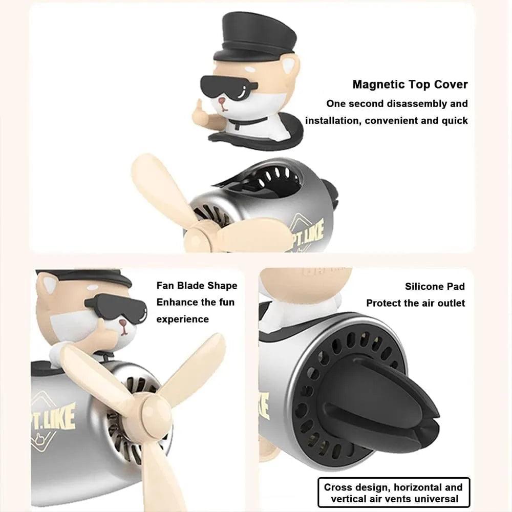 Features of the Shiba Inu pilot car air freshener with propeller diffuser, highlighting the magnetic top cover, fan blade shape, and silicone pad.