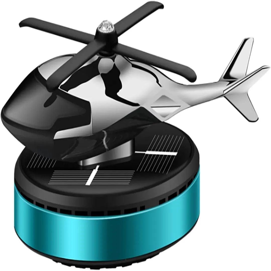 Blue and black solar-powered helicopter propeller car air freshener on a round base, providing a modern fragrance solution for enhancing car interiors.